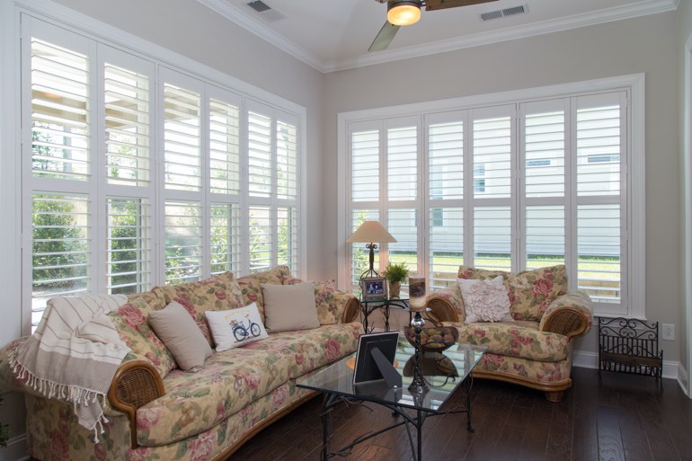 Traditional sunroom with interior shutters in San Jose.